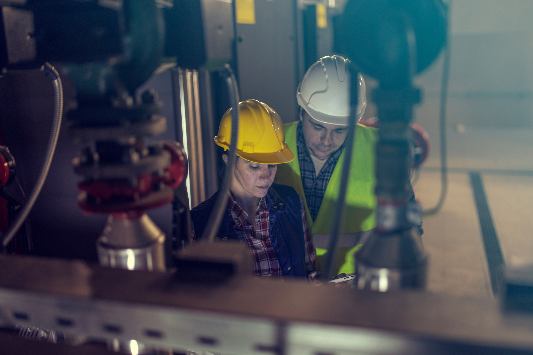 Technicians working in factory or utility