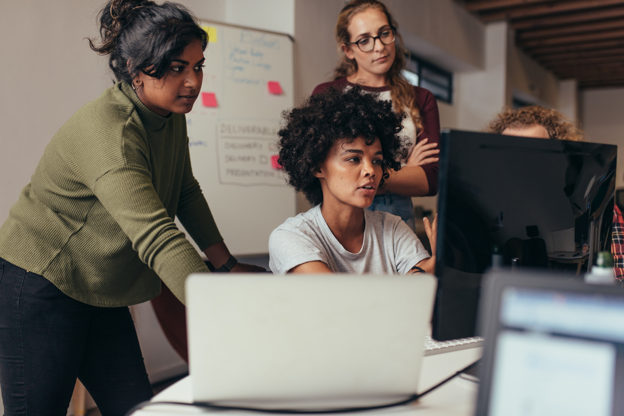 Software Engineers Working on Project Together